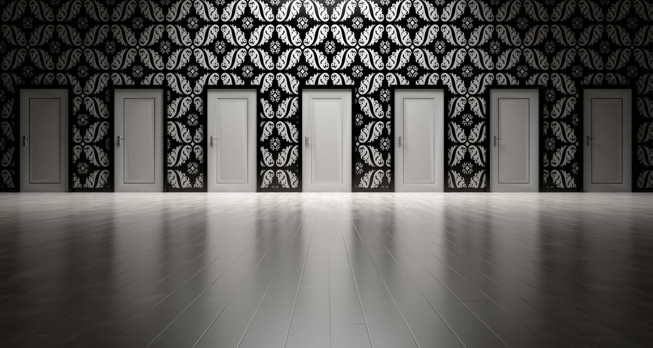 The Art of Drawing Readers In: Your attractive post title goes here Five closed doors in a black and white ornate hallway symbolizing opportunities and decisions.